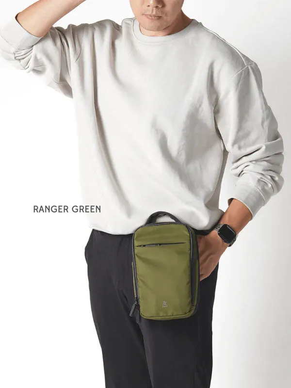 Bold Mimic: Multi-Carry Sling/Backpack in Forest Green Color